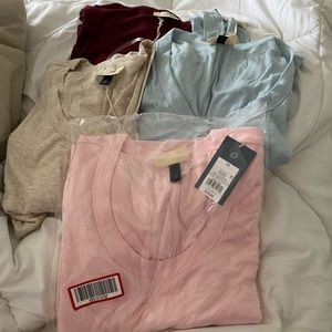 NWT bundle of universal threads t shirts size 1 x. Wine, pink, beige and blue.